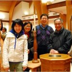 Students Around Baptismal Font