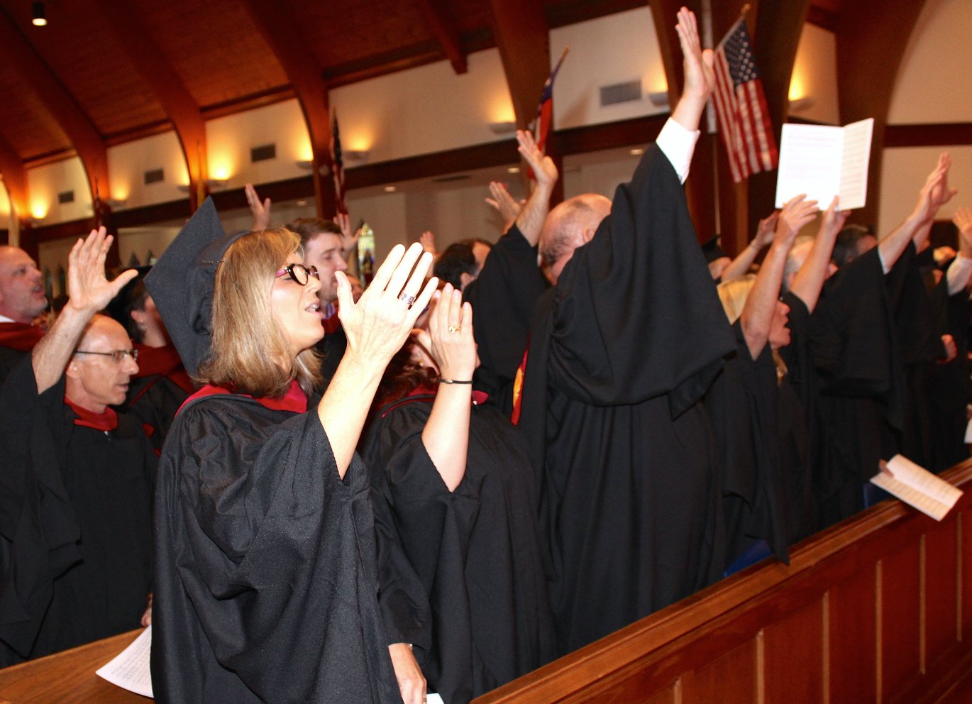 Hands lifted in praise at Commencement 2015