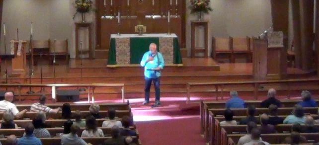 Chaplain Darrell Harris speaking