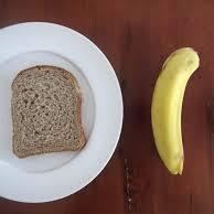 Bread and banana on table